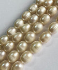 Freshwater Rice Pearls 6–7mm White – Natural Pearl Beads, 0.8mm Hole Freshwater Rice Pearls 6–7mm White – Natural Pearl Beads, 0.8mm Hole
