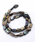 Natural Paua Shell Nugget Bead Strand – Colourful, 6–16mm Natural Paua Shell Nugget Bead Strand – Colourful, 6–16mm