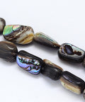 Natural Paua Shell Nugget Bead Strand – Colourful, 6–16mm Natural Paua Shell Nugget Bead Strand – Colourful, 6–16mm