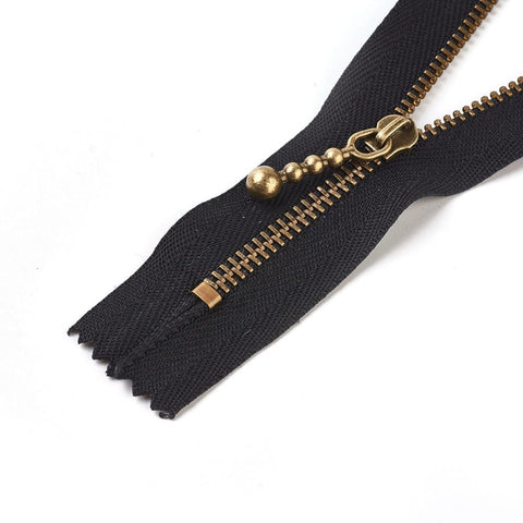 Nylon Closed-End Zipper with Metal Puller – Black & Antique Bronze, 20cm Nylon Closed-End Zipper with Metal Puller – Black & Antique Bronze, 20cm