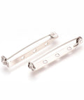 304 Stainless Steel Pin Brooch Back Bar Findings, about 38~40mm 304 Stainless Steel Pin Brooch Back Bar Findings, Stainless Steel Color Size: about 38~40mm long, 5mm wide, 6mm thick, hole: 2mm; pin: 0.8mm.