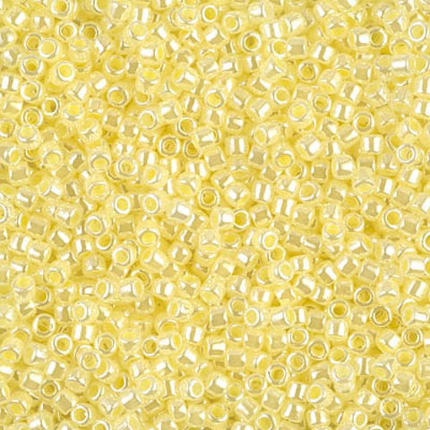 50g MIYUKI DELICA 10-0 LINED CRYSTAL PALE YELLOW LUSTER (DBM0232-50G) DELICA 10/0 LINED CRYSTAL PALE YELLOW LUSTER