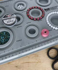 (BBS8F-C) BRACELET BEAD BOARD W/ 8SIZES +WITH LID-FLOCKED (1 PC) (BBS8F-C) BRACELET BEAD BOARD W/ 8SIZES +WITH LID-FLOCKED (1 PC)