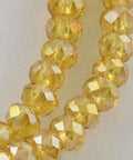 (BE5542) Electroplate Glass Beads Strands, AB Color Plated, Faceted Rondelle, Goldenrod 4MM Electroplate Glass Beads Strands, AB Color Plated, Faceted Rondelle, Goldenrod Size: about 3.5~4mm in diameter, 2.5~3mm thick, hole: 0.5mm; about 150pcs/strand, 15.5".