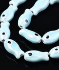 BeadsBalzar Beads & Crafts LIGHT CYAN (CF8262-03O) (CF8262-X) Ceramic Beads, Bright Glazed Porcelain, Fish, 19mm (4 PCS)