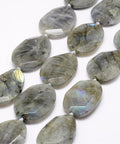 (BG5219) Natural Labradorite Beads Strands, Faceted, Oval, 30-37MM LONG Natural Labradorite Beads Strands, Faceted, Oval, Size: about 22~25mm wide, 35~37mm long, 6~7mm thick, hole: 2mm, about 9~10pcs/strand, 13.7"(35cm).