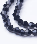 Bicone Beads, Faceted Bicone Glass Beads Strands, Black 4MM 118pcs/Strand Imitation #5301 Bicone Beads, Faceted Bicone Glass Beads Strands, Black Size: about 4mm long, 4mm wide, hole: 1mm; about 118pcs/strand.