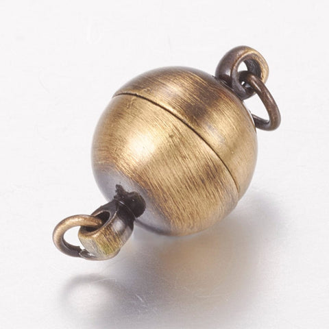 ANTIQUE BRONZE Brass Magnetic Clasps, Oval, Copper 17MM Brass Magnetic Clasps, Lead Free, Cadmium Free and Nickel Free, Oval, Red Copper Size: about 10mm wide, 17mm long, hole: 3mm.