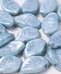 (LE14-03000-14464) CHALK WHITE BABY BLUE LUSTER CZECH GLASS LEAVES 9 X 14 MM CZECH GLASS LEAVES 9 X 14 MM