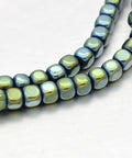 Electroplate Non-magnetic Synthetic Hematite Cube Beads, Green, 3mm Cube Electroplate Non-magnetic Synthetic Hematite Beads Strands, Green Plated Size: about 3mm wide, 3mm long, 3mm thick, hole: 0.5mm; about 150pcs/strand, 15.7".