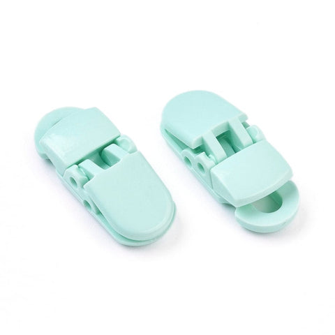 Environmental Opaque Solid Colour Plastic Baby Pacifier Holder Clip, Aquamarine Size: about 12.5mm long, 32mm wide Environmental Opaque Solid Colour Plastic Baby Pacifier Holder Clip, Aquamarine Size: about 12.5mm long, 32mm wide, 9mm thick, hole: 6.5x4.5mm.