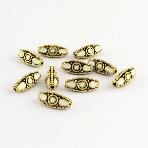 (FB5139G) Triangle Handmade Indonesia Beads, with Alloy Cores, Antique Golden, White 19MM Triangle Handmade Indonesia Beads, with Alloy Cores, Antique Golden, White Size: about 19mm long, 8mm wide, 8mm thick, hole: 1.5mm.