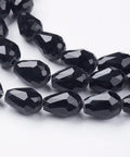 Glass Beads Strands, Faceted, Drop, Black, 11mm Glass Beads Strands, Faceted, Drop, Black Size: about 11mm long, 8mm wide, hole: 1mm; about 60pcs/strand, 28".