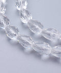 Glass Beads Strands, Faceted, Drop, Clear, 11mm Glass Beads Strands, Faceted, Drop, Clear Size: about 11mm long, 8mm wide, hole: 1mm; about 60pcs/strand, 28".