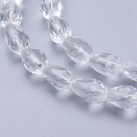 Glass Beads Strands, Faceted, Drop, Clear, 11mm Glass Beads Strands, Faceted, Drop, Clear Size: about 11mm long, 8mm wide, hole: 1mm; about 60pcs/strand, 28".
