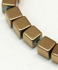 (HB5107) Hematite Beads Strands, Cube, Copper Plated 3MM Non-magnetic Synthetic Hematite Beads Strands, Cube, Copper Plated Size: about 3mm wide, 3mm long, 3mm thick, hole: 0.5mm, about 120pcs/strand, 15.7".
