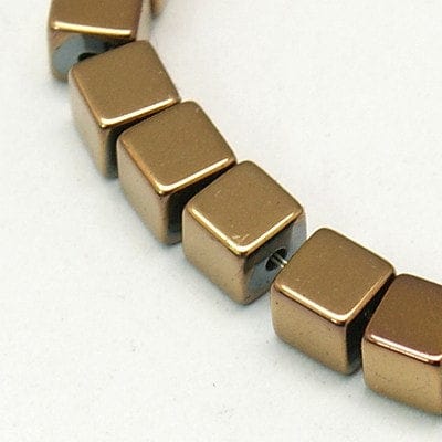 (HB5107) Hematite Beads Strands, Cube, Copper Plated 3MM Non-magnetic Synthetic Hematite Beads Strands, Cube, Copper Plated Size: about 3mm wide, 3mm long, 3mm thick, hole: 0.5mm, about 120pcs/strand, 15.7".