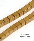 (HB5121) Hematite Beads Strands, Cube, Golden Plated 2MM Non-magnetic Synthetic Hematite Beads Strands, Cube, Golden Plated Size: about 2mm in diameter, hole: 1mm, about 174pcs/strand, 15.5".