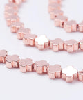 (HB5457) Electroplate Non-Magnetic Synthetic Hematite Beads Strands, Greek Cross, Rose Gold Plated 4MM Electroplate Non-Magnetic Synthetic Hematite Beads Strands, Greek Cross, Rose Gold Plated Size: about 4mm wide, 3.5mm long, 2mm thick, hole: 0.6mm, about 104pcs/strand, 15.9"(40.5cm).