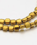 Hematite Beads Strand, Column, Golden Plated 3MM (HB5119) Electroplate Non-magnetic Synthetic Hematite Beads Strand, Column, Golden Plated Size: about 3mm wide, 3mm long, 2mm thick. hole: 1mm; about 150pcs/strand, 15.7"