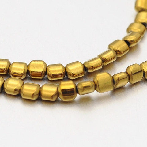 Hematite Beads Strand, Column, Golden Plated 3MM (HB5119) Electroplate Non-magnetic Synthetic Hematite Beads Strand, Column, Golden Plated Size: about 3mm wide, 3mm long, 2mm thick. hole: 1mm; about 150pcs/strand, 15.7"