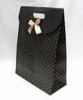 Kraft Paper Carrier-Gift Bags with bowknot about 24cm wide, 32cm long Kraft Paper Carrier/Gift Bags with bowknot about 24cm wide, 32cm long