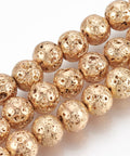 (LB5632) Electroplated Natural Lava Bead Strands, Round, Bumpy, Light Gold Plated 7MM Electroplated Natural Lava Bead Strands, Round, Bumpy, Light Gold Plated Size: about 6~7mm in diameter, hole: 1mm; about 61pcs/strand, 15.7".