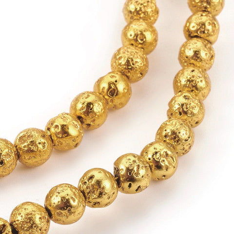 (LB5883A) Electroplated Natural Lava Bead Strands, Round, Gold Size: about 10~10.5mm Electroplated Natural Lava Bead Strands, Round, Gold Size: about 10~10.5mm in diameter, hole: 1.5mm; about 38~39pcs/strand, 15.27"~15.55"(38.8~39.5cm).  Please Note: the beads size within the error range of 0.5~1mm.
