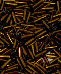 MIYUKI BUGLES #2 - 6 X 1,7 MM DK TOPAZ SILVER LINED (20 GMS) BUGLES #2 - 6 X 1,7 MM DK TOPAZ SILVER LINED