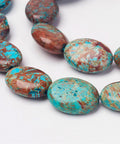 Natural Chrysocolla Beads Strands, Dyed & Heated, Flat Oval, 19.5~20.5mm Natural Chrysocolla Beads Strands, Dyed & Heated, Flat Oval Size: about 15mm wide, 19.5~20.5mm long, 6~7mm thick, hole: 1mm; about 20pcs/strand, 15.3"(39cm).
