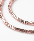 Non-Magnetic Synthetic Hematite Beads Strands, Polygon, Faceted, Rose Gold Plated 3MM Non-Magnetic Synthetic Hematite Beads Strands, Polygon, Faceted, Rose Gold Plated Size: about 3mm wide, 3mm long, 2mm thick, hole: 1mm; about 198pcs/strand, 16.1"