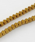 GOLDEN PLATED Non-magnetic Synthetic Hematite, Faceted Cube, 4mm Non-magnetic Synthetic Hematite Beads Strands, Faceted, Grade A, Round, Green Plated Size: about 4mm in diameter, 4mm thick, hole: 1mm; 100pcs/strand, 15.5".