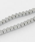 (HB5306-7) SILVER PLATED Non-magnetic Synthetic Hematite, Faceted Cube, 4mm Non-magnetic Synthetic Hematite Beads Strands, Faceted, Grade A, Round, Green Plated Size: about 4mm in diameter, 4mm thick, hole: 1mm; 100pcs/strand, 15.5".