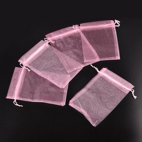 Organza Bags, Pink about 7x9cm Organza Bags, Pink about 7cm wide, 9cm long  Due to the handmade bags, the size within the error range of 0.5cm.