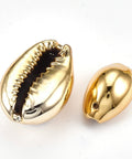 (SH5759A) Cowrie Shell Pendants, with UV Plated, Gold Size: about 15~20mm long Cowrie Shell Pendants, with UV Plated, Gold Size: about 15~20mm long, 9~14mm wide, 7~10mm wide, hole: 1mm.