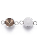 (SL6152A) 304 Stainless Steel Connector Rhinestone Settings, Flat Round,Steel Color 12mm long,  fit for 5mm rhinestone (5 PCS) 304 Stainless Steel Connector Rhinestone Settings, Flat Round, Stainless Steel Color Size: about 12mm long, 6mm wide, 3mm thick, hole: 1.8mm, fit for 5mm rhinestone.