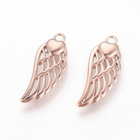 (SW5481) 304 Stainless Steel Pendants, Wings with Heart, Rose Gold 20MM 304 Stainless Steel Pendants, Wings with Heart, Rose Gold Size: about 20mm long, 8mm wide, 2.5mm thick, hole: 1.6mm.