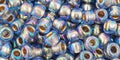 (TR-06-997) TOHO - Round 6/0 : Gold-Lined Rainbow Lt Sapphire (25 GMS) (TR-06-997) TOHO - Round 6/0 : Gold-Lined Rainbow Lt Sapphire (25 GMS)